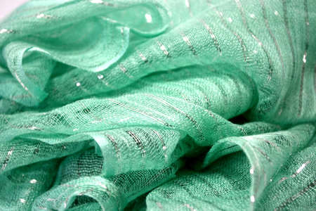 green woven scarf close upの写真素材