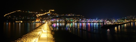 Alanyan port panorama with pier at night の写真素材