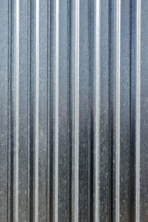 Striped metal sheet for background textureの写真素材