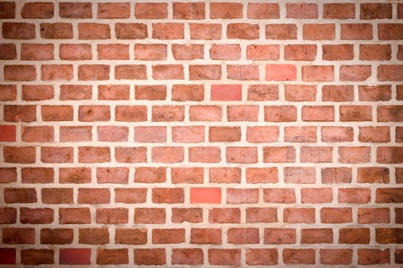 Old red brick wall for background