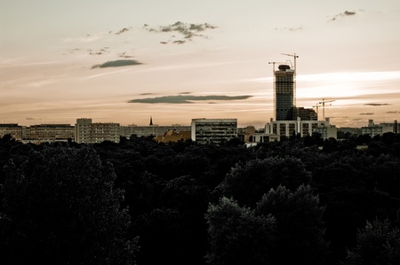Grunge scene with Wroclaw's skyscrapers during the sunsetの写真素材