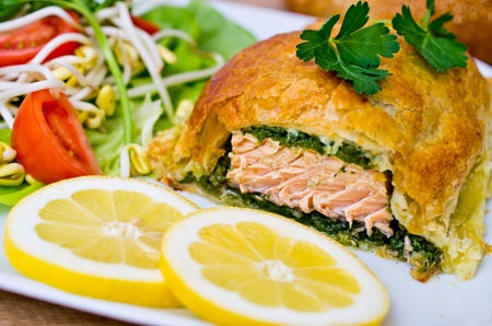 Traditional salmon in puff pastry with spinachの写真素材
