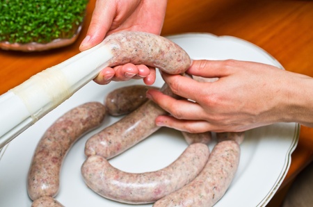 Homemade traditional sausage during the preparationの写真素材
