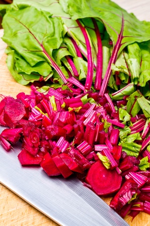 Cutted chard on the wooden board ready to soup makingの写真素材