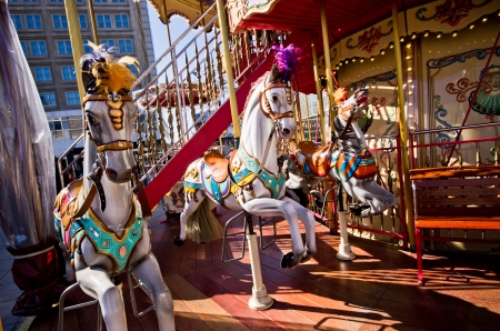 Old-style carousel with beautiful poniesの写真素材