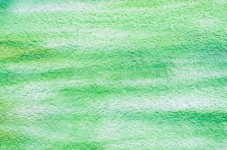 Green wall surface for usage as backgroundの写真素材