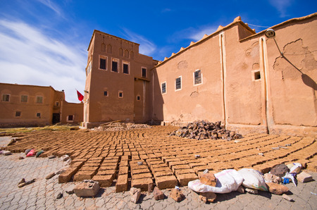 Kasbah and bricks dried on the sun in Ouarzazate, Morocco