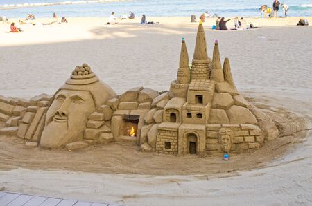 Barcelona, Spain - March 03, 2016: figures made from sand. Very popular activity on Barceloneta beach. One of most famous in Barcelona.のeditorial素材