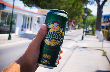 Rhodes island, Greece - July 23, 2016: Mythos beer in the can. It is very popular greek beer.のeditorial素材