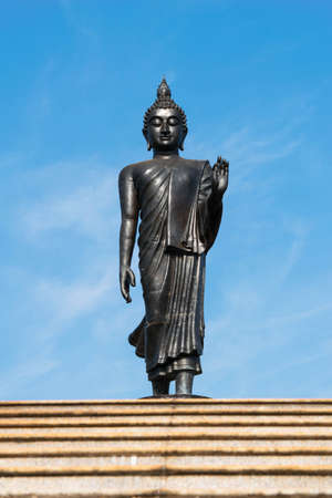 Buddha statue on blue sky backgroundの写真素材