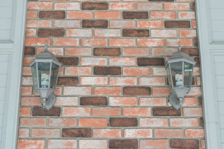 Two lamp with stone wall background textureの写真素材