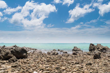 Beach with rock and tropical sea in Thailandの写真素材