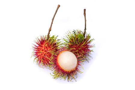 rambutan and one peel off rind on white backgroundの写真素材