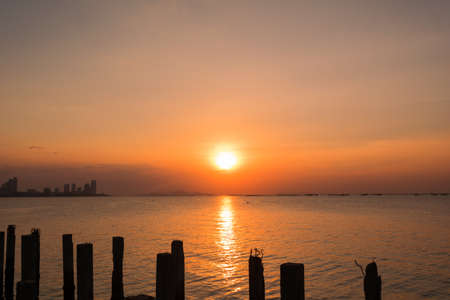Sunset at Djittabhawan Temple tourist attraction at Pattaya of Thailandの写真素材