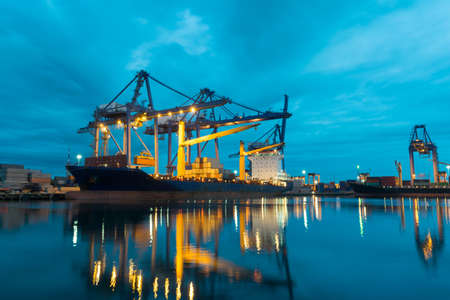 Container ship in asia port while load the job.の写真素材
