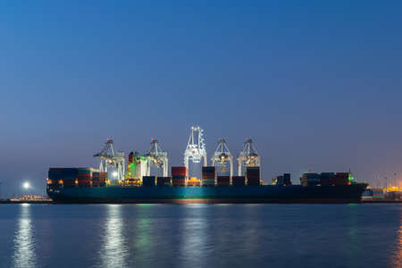 Container ship in asia port while load the jobの写真素材