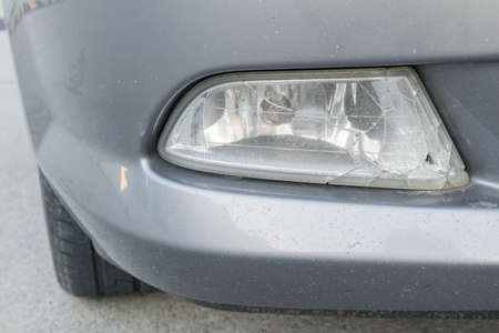 broken on spotlight or blinker of carの写真素材