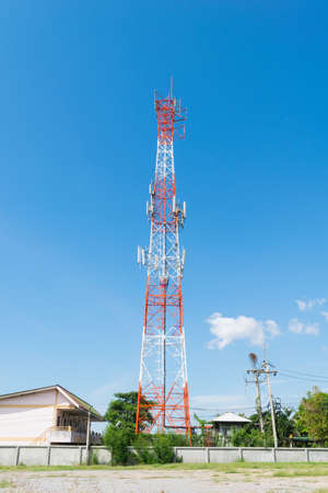 Telecommunications tower with blue sky backgroundの写真素材