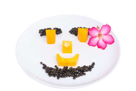 ripe papaya-Men with flower isolated on white backgroundの写真素材