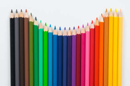 close up colour wooden pencils isolated on white backgroundの写真素材