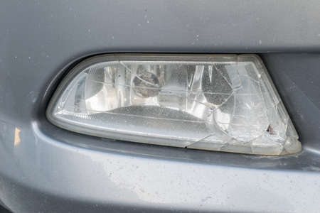 broken on spotlight or blinker of carの写真素材