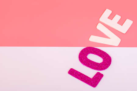Word LOVE on pink color and white color for background, valentineの写真素材