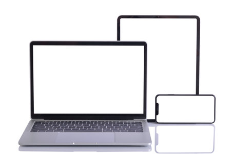 Laptop isolate and tablet isolate and mobile phone behide with empty space on white backgroundの写真素材