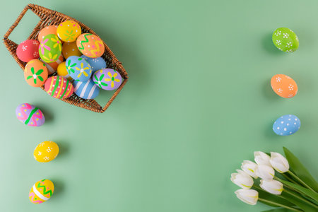 Easter eggs many color in basket with flower for easter backgroundの写真素材