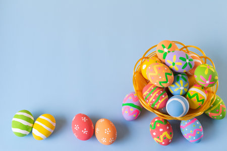 Easter eggs many color in basket for easter backgroundの写真素材