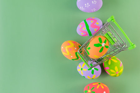 Easter eggs many color on trolley for easter backgroundの写真素材