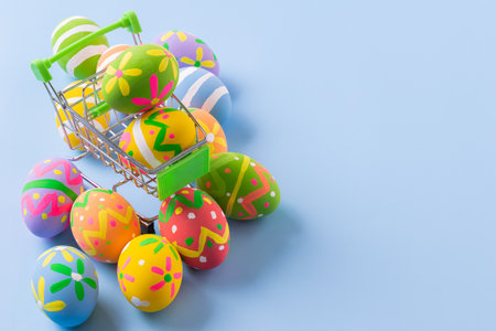 Easter eggs many color on trolley for easter backgroundの写真素材