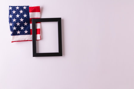 Happy presidents day concept with flag of the United States on white background with tulips for top view conceptの写真素材