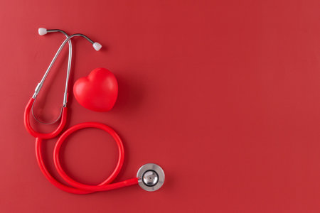 Red statoscope with red heart for Valentine day, World Health Day,World Blood Donor Day and Doctor day for concept top view background.の写真素材