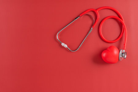 Red statoscope with red heart for Valentine day, World Health Day,World Blood Donor Day and Doctor day for concept top view background.の写真素材