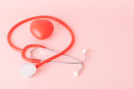 Red heart with doctor physician's stethoscope, World heart health day, doctor day.の写真素材