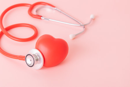 Red heart with doctor physician's stethoscope, World heart health day, doctor day.の写真素材