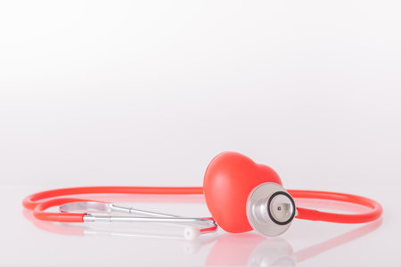 Red heart with doctor physician's stethoscope, World heart health day, doctor day.の写真素材