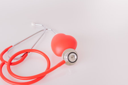 Red heart with doctor physician's stethoscope, World heart health day, doctor day.の写真素材