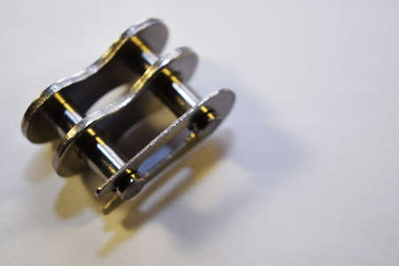 Metal link chain, stainless on white background.の写真素材