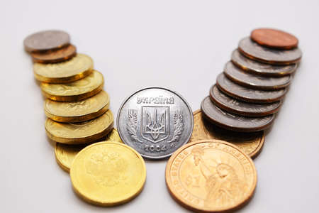 Coin of Ukraine between the Russian and American.の写真素材