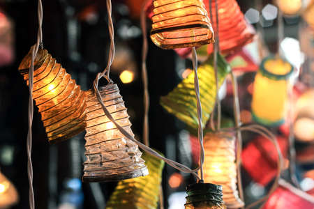 colorful lamps in darknessの写真素材