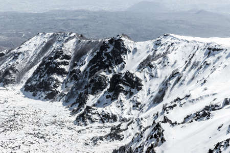 snow on mount etna in winterの写真素材