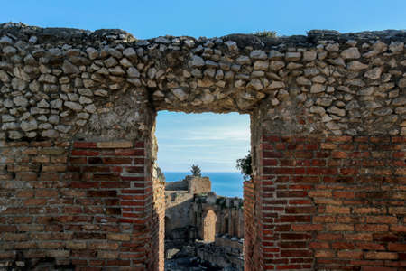 old ruins of greek theater in taormina sicilyの写真素材