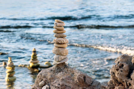 a pile of rocks at coastの写真素材