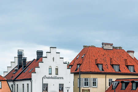 buildings with red roof in visby swedenのeditorial素材