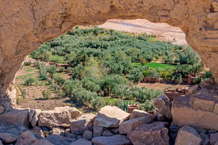 hole on stone wall at ait ben haddouの写真素材