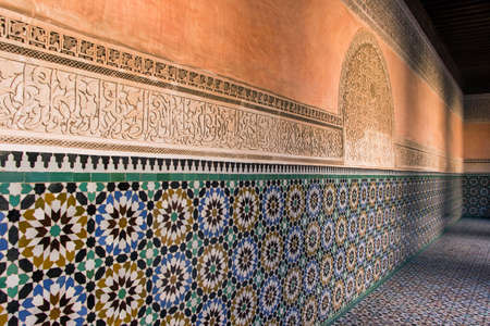 Colorful tiles on wall in Ben Youssef Madrasa