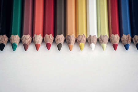 a pile of colorful pencils with white backgroundの写真素材