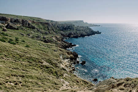 blue ocean with cliff in Maltaの写真素材