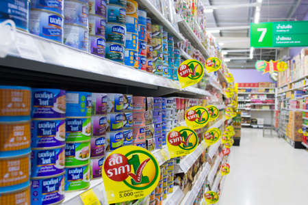 Canned food product on shelf in supermarket Tesco Lotus Thailand close upのeditorial素材